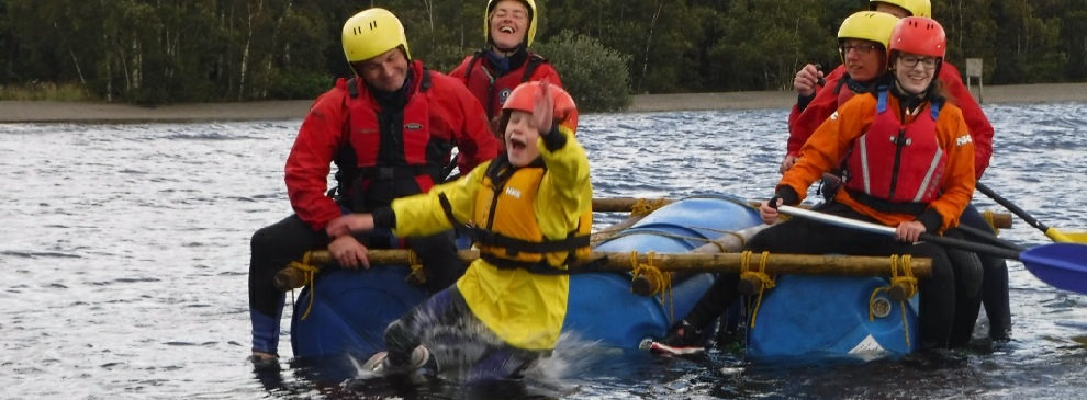 man over board raft building lake district